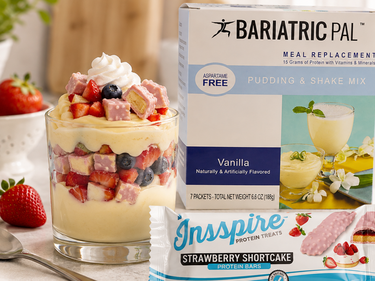 High-protein strawberry shortcake pudding parfait with fresh berries, BariatricPal Vanilla Pudding Mix, and Inspire Strawberry Shortcake Protein Bar.