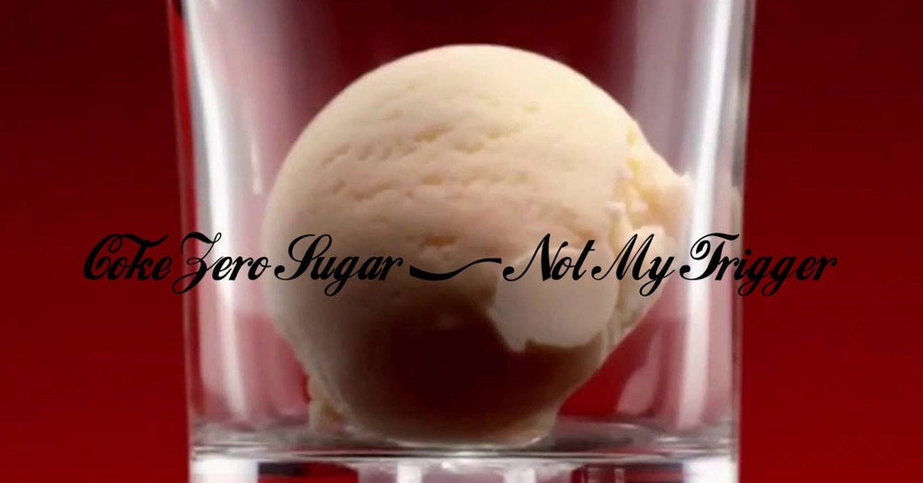 Vanilla ice cream scoop in a glass against a red background, with black cursive text across the image.