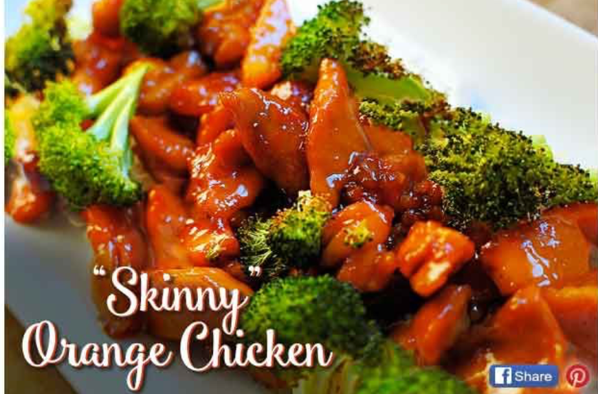 Orange-glazed chicken pieces served with roasted broccoli on a white plate.