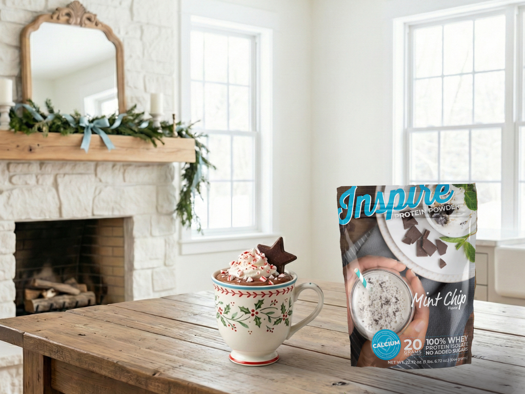 Peppermint Mocha Protein Pudding in a festive holiday cup with crushed peppermint on top