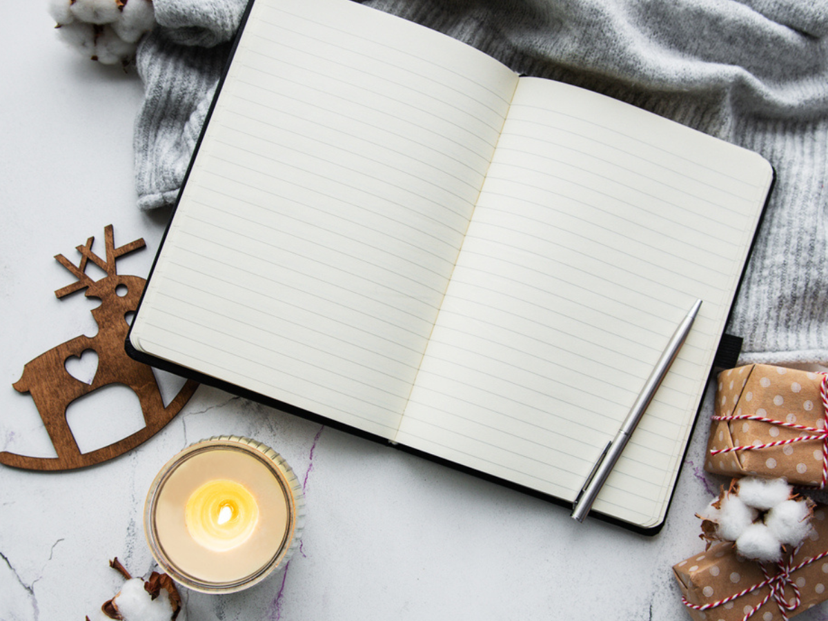  A calm, minimalist wellness scene with a water bottle, journal, and soft lighting