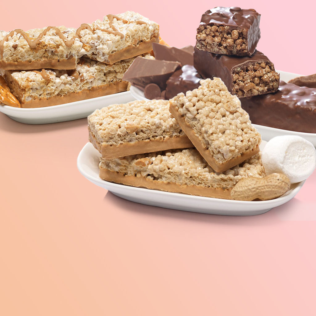 A variety of snack bars, including rice crispy treats and chocolate-covered bars, are displayed on white plates against a soft pink background, highlighting their textures and flavors.