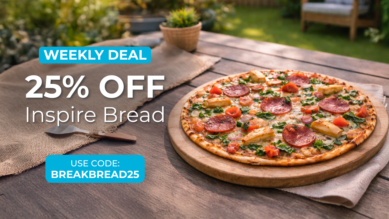 Pizza on a wooden board with a 'Weekly Deal' advertisement for Inspire Bread.